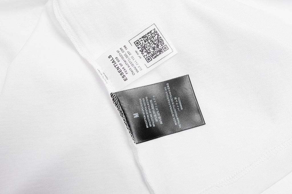 ESSENTIALS FG Monogram Chest Graphic T-Shirt — hang_tag